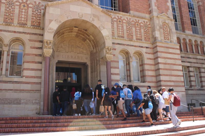 EAOP Welcome guests begin tour at UCLA's Powell Library.
