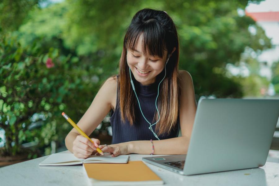 young woman working on computer